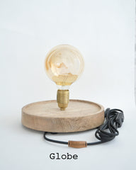 Stolplamp Ohm met houten voet. Stolplamp met voet van mango hout en stolp van gerecycled glas. Prachtige sfeerverlichting! Lamp ontworpen en gemaakt door Studio Stockhome. 